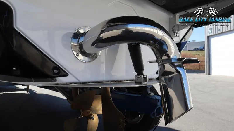 Slide: The Image of 2024 Nautique GS24 boat exhaust and propeller detail at Race City Marine. - 35