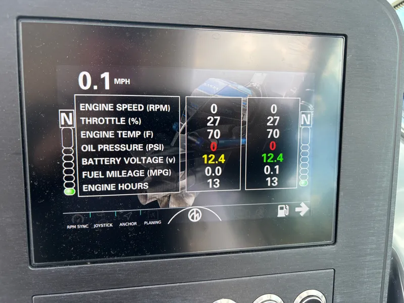 Slide: The Image of Aviara AV32 2024 boat display showing engine and battery data. - 33