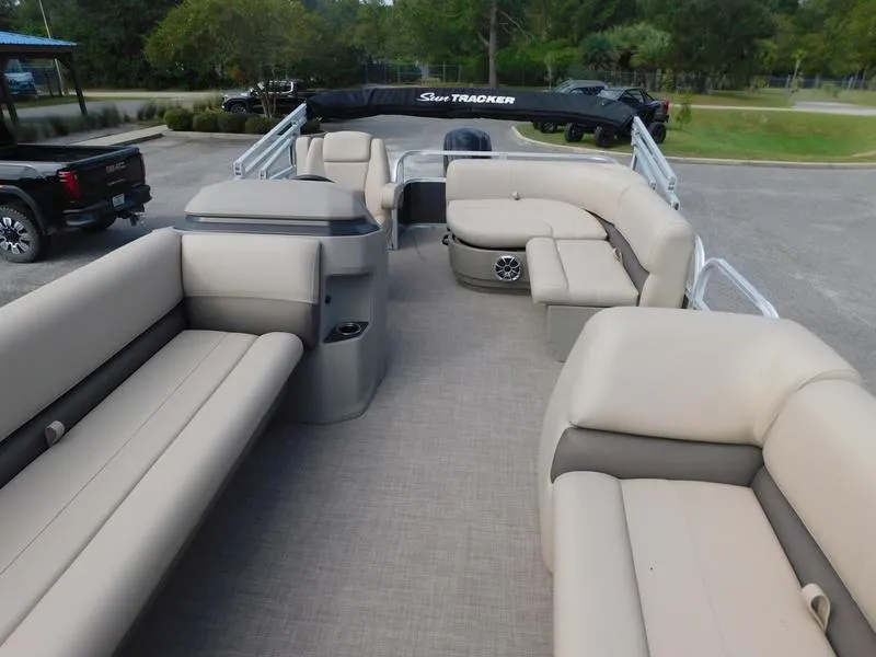 Slide: The Image of 2024 Sun Tracker Party Barge 18 DLX pontoon boat with spacious seating and modern design. - 6