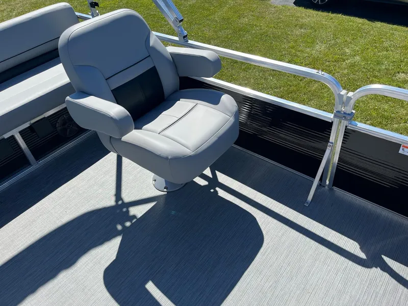 Slide: The Image of 2024 Lowe Ultra 160 Cruise boat with a comfortable captain's chair. - 14