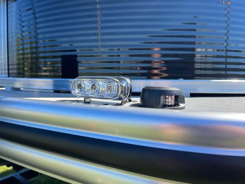 Slide: The Image of Close-up of 2024 Lowe Ultra 160 Cruise pontoon boat exterior details. - 17