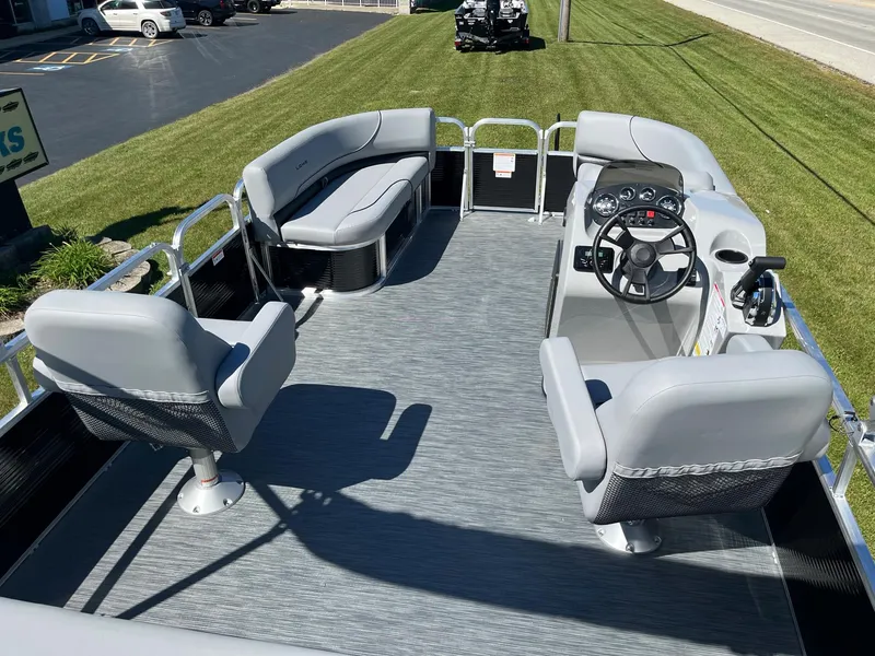Slide: The Image of 2024 Lowe Ultra 160 Cruise pontoon boat with spacious seating and modern steering console. - 5
