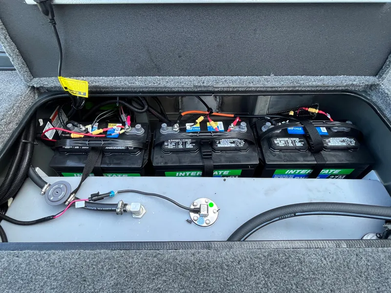 Slide: The Image of Battery compartment of 2024 Ranger RT178 boat with three Interstate batteries. - 10