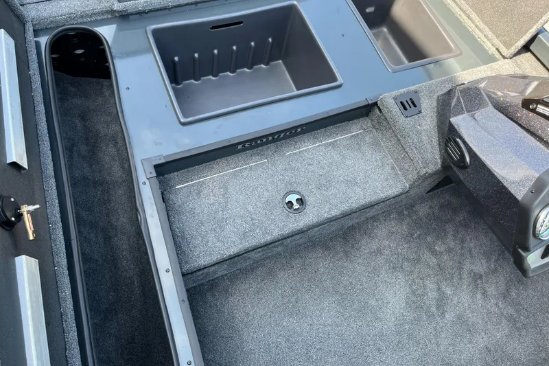 Slide: The Image of 2024 Ranger RT178 boat interior storage compartments and deck. - 4