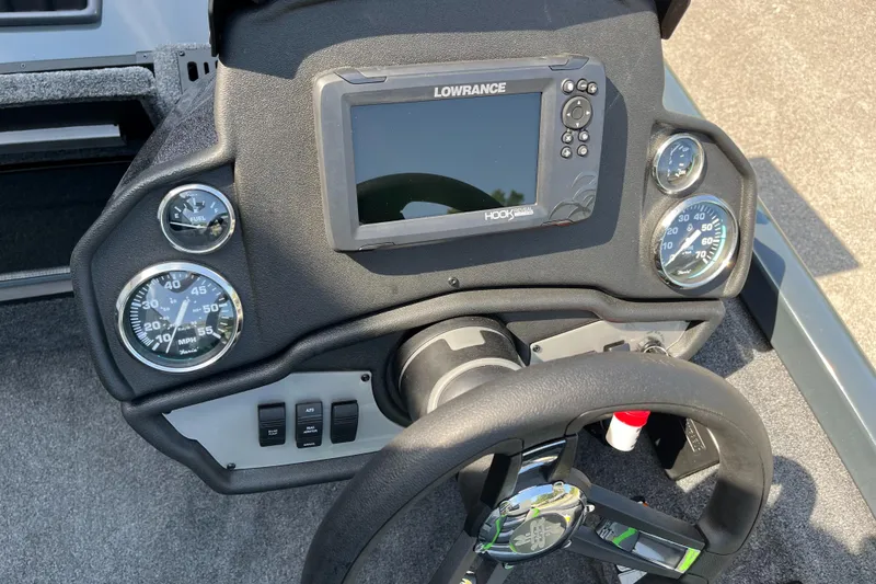 Slide: The Image of 2024 Ranger RT178 boat dashboard with Lowrance fishfinder and gauges. - 6