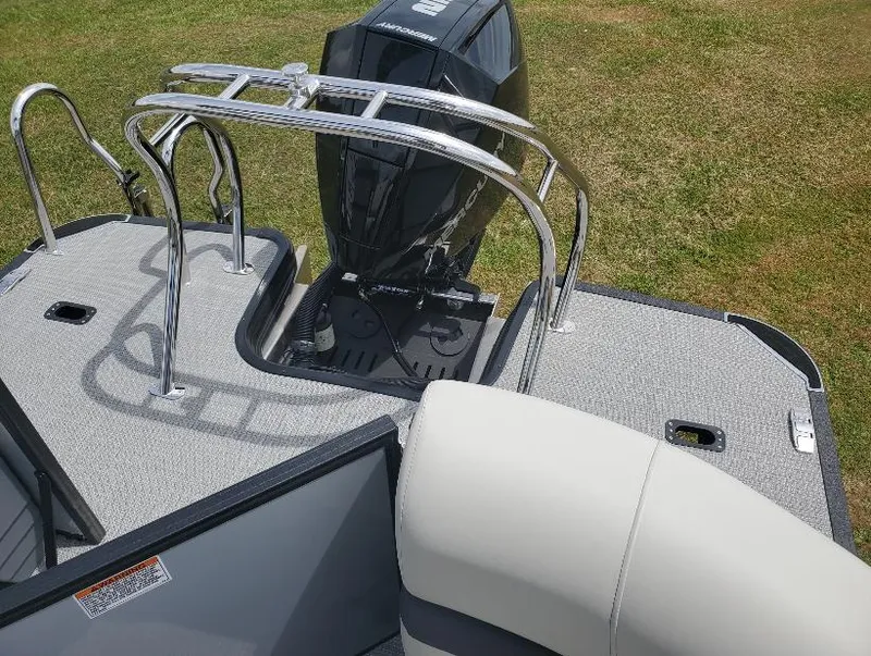 Slide: The Image of 2023 Starcraft EXS-5 boat with outboard motor and stainless steel railings. - 4