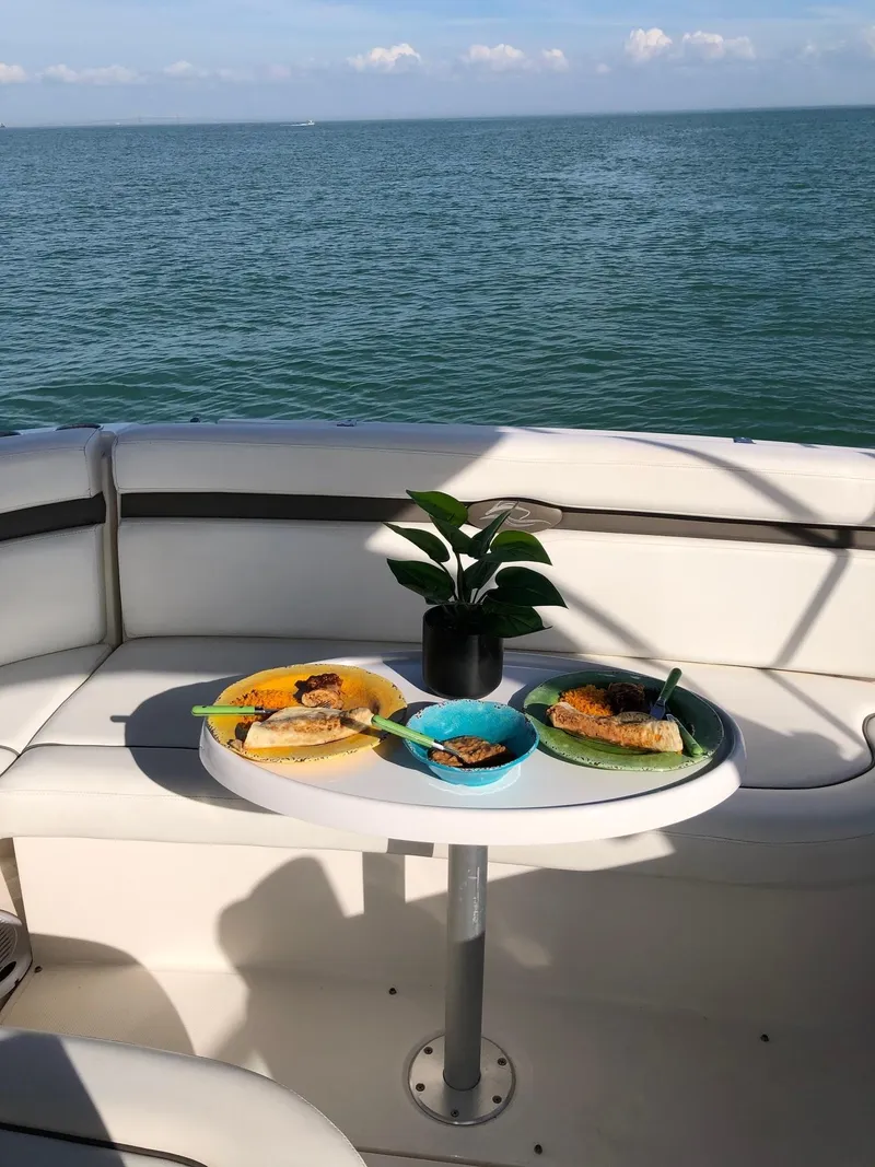 Slide: The Image of Dining on a 2008 Rinker 350 Express Cruiser with ocean view. - 20