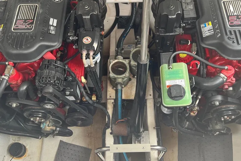 Slide: The Image of 2008 Rinker 350 Express Cruiser engine compartment with dual 5.7 OSXi engines. - 21