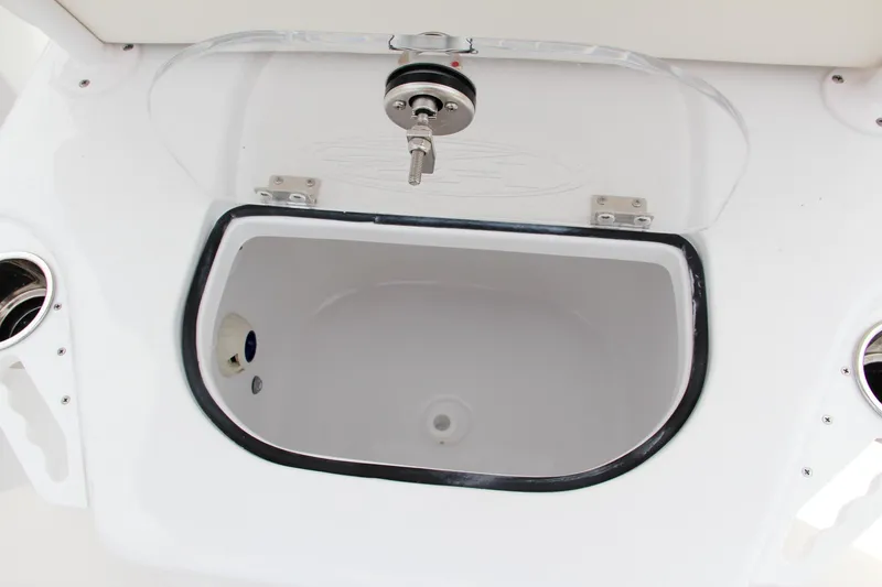 Slide: The Image of 2024 Sea Hunt Ultra 239 SE livewell with lid open. - 20