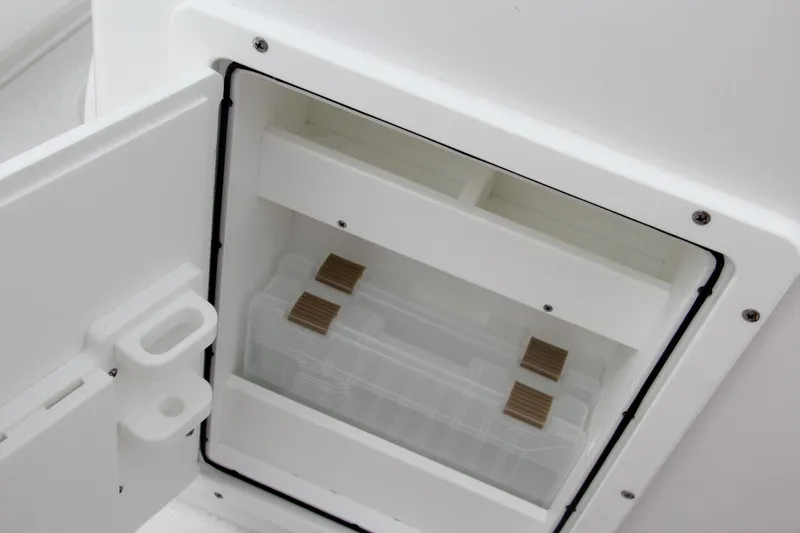 Slide: The Image of Storage compartment on the 2024 Sea Hunt Ultra 239 SE boat. - 26