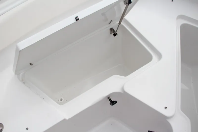 Slide: The Image of 2024 Sea Hunt Ultra 239 SE storage compartment. - 37