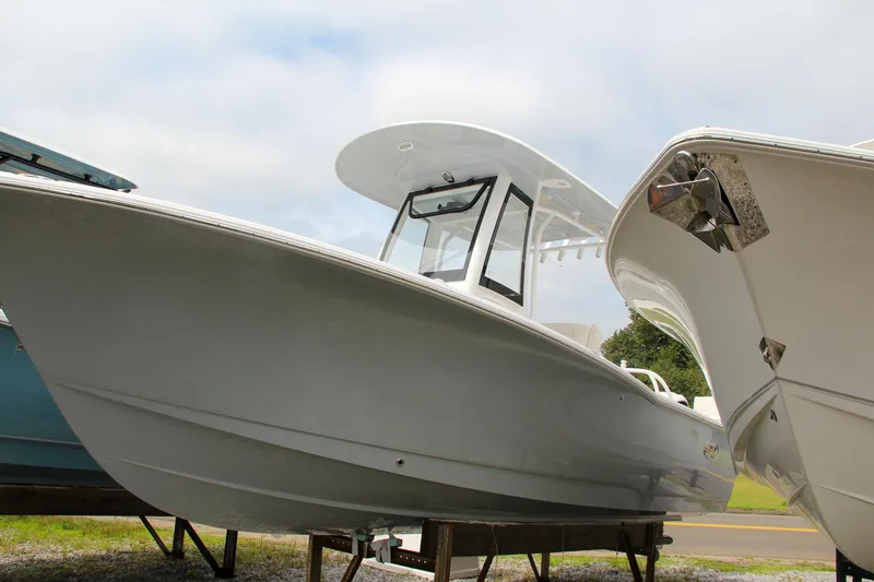 Slide: The Image of 2024 Sea Hunt Ultra 239 SE boat on display. - 4