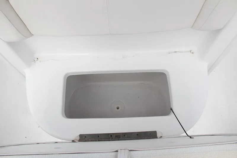 Slide: The Image of 2024 Sea Hunt Ultra 239 SE storage compartment. - 40