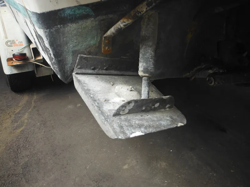 Slide: The Image of 1988 Sea Ray 268 Sundancer boat stern with trim tab and trailer. - 12