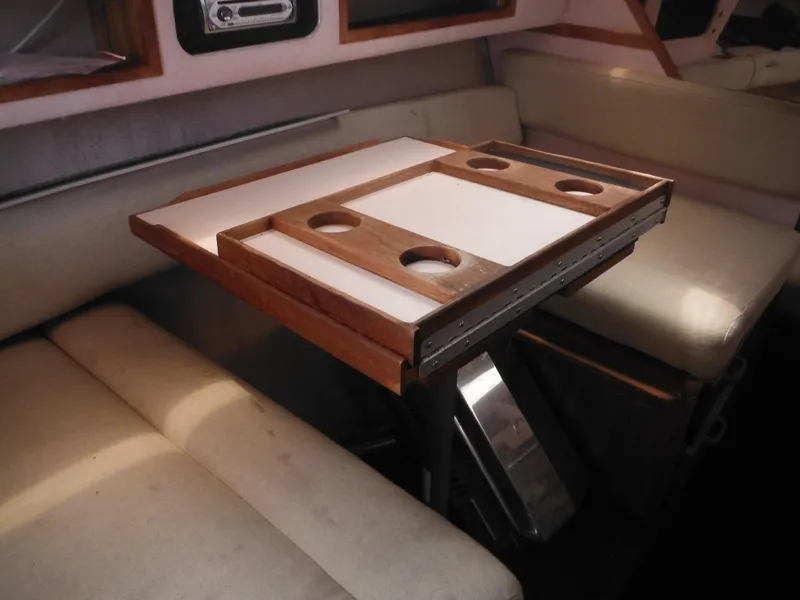 Slide: The Image of Interior seating and table of 1988 Sea Ray 268 Sundancer boat. - 25