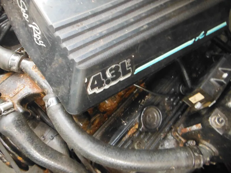 Slide: The Image of 1988 Sea Ray 268 Sundancer 4.3L engine close-up. - 42