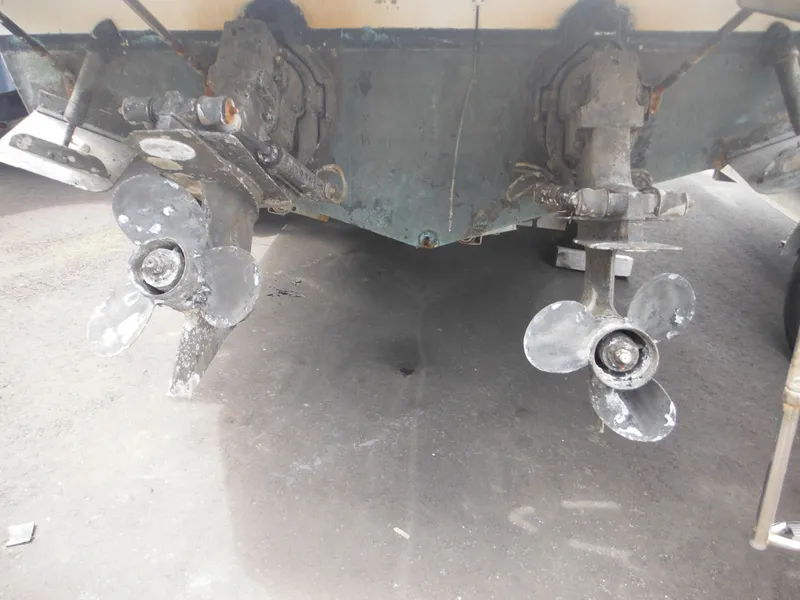 Slide: The Image of 1988 Sea Ray 268 Sundancer dual propellers in dry dock. - 7