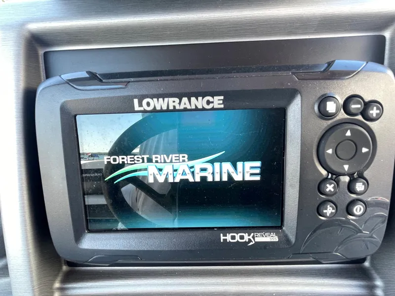 Slide: The Image of Lowrance Hook Reveal fish finder on 2023 Berkshire 24 UL CTS boat. - 10