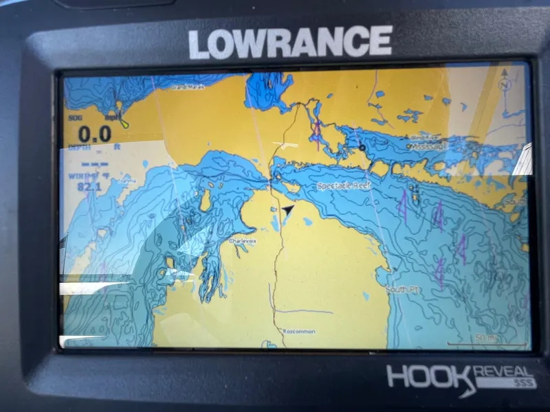Slide: The Image of Lowrance Hook Reveal GPS display on a 2023 Berkshire 24 UL CTS boat. - 11