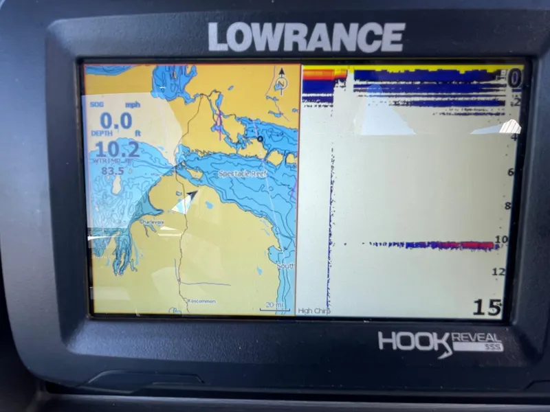 Slide: The Image of Lowrance HOOK Reveal fish finder display on a 2023 Berkshire 24 UL CTS boat. - 14