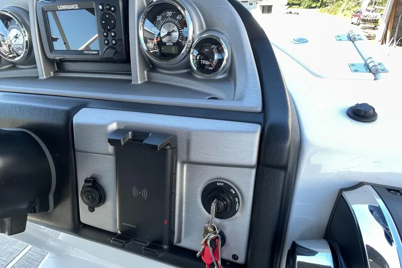 Slide: The Image of Dashboard of 2023 Berkshire 24 UL CTS boat with gauges and ignition keys. - 17