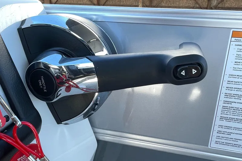 Slide: The Image of Throttle control lever of 2023 Berkshire 24 UL CTS boat. - 18