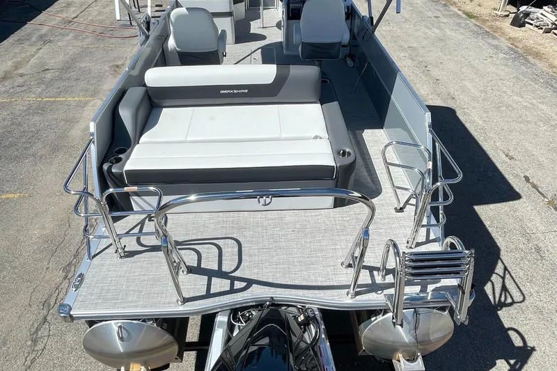 Slide: The Image of 2023 Berkshire 24 UL CTS pontoon boat with spacious seating and modern design. - 6