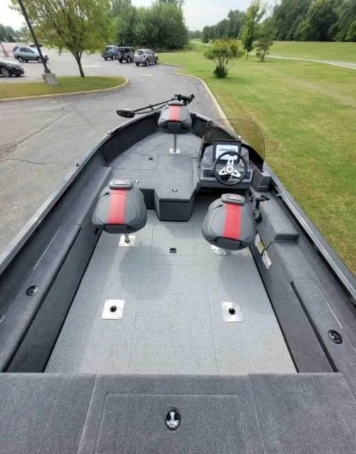 Slide: The Image of 2023 Ranger VS1882SC Reata fishing boat with dual seats and modern dashboard. - 4