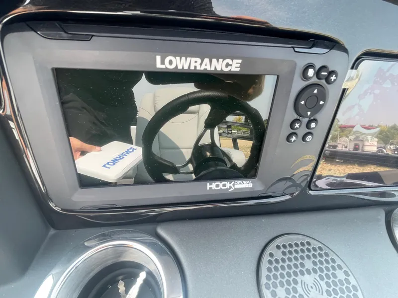 Slide: The Image of Lowrance Hook Reveal fish finder on 2024 Regency 250 DL3 boat dashboard. - 16