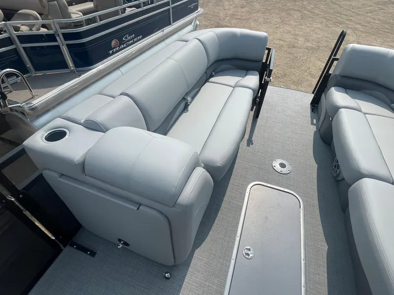 Slide: The Image of 2024 Regency 250 DL3 pontoon boat with luxurious seating and modern design. - 17