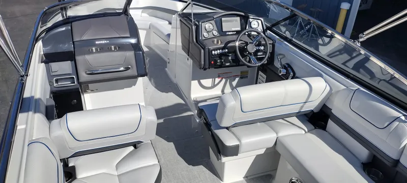 Slide: The Image of 2024 Formula 240 BR boat interior with modern dashboard and comfortable seating. - 15