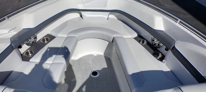 Slide: The Image of 2024 Formula 240 BR boat interior with spacious seating and cup holders. - 18