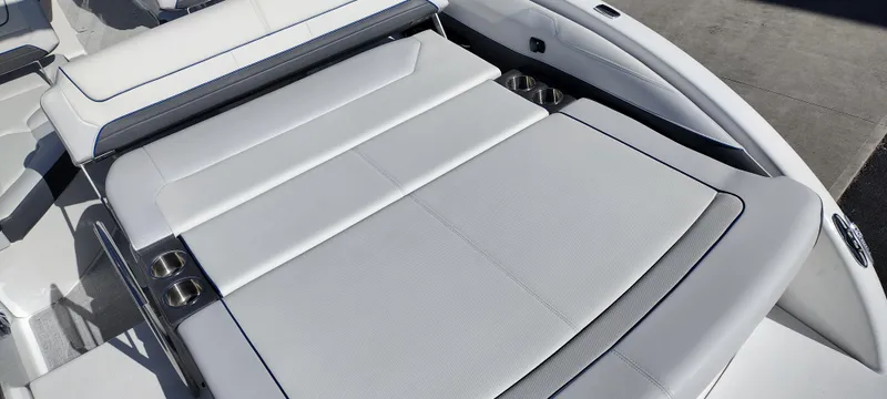 Slide: The Image of 2024 Formula 240 BR boat with spacious sunpad and cup holders. - 26