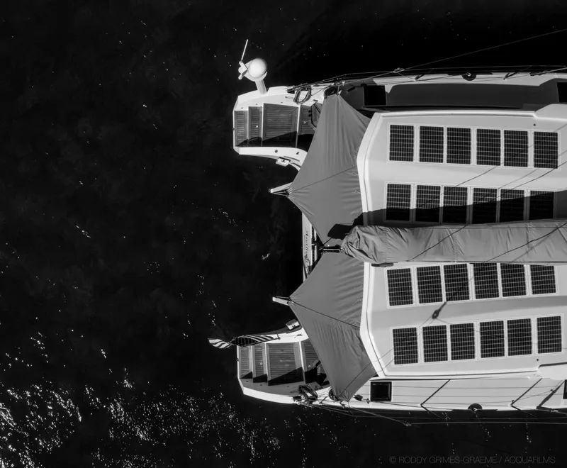 Slide: The Image of Aerial view of 2015 Gunboat 60 catamaran with solar panels on deck. - 16