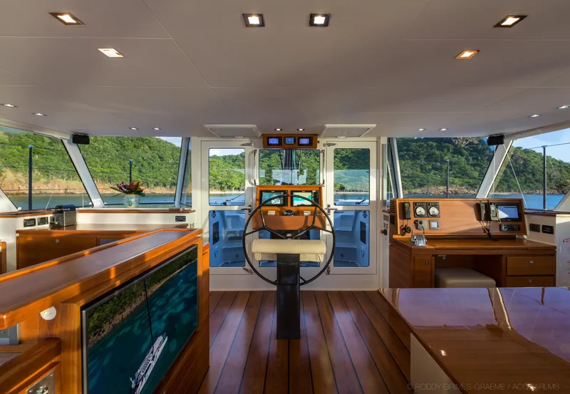 Slide: The Image of Interior of 2015 Gunboat 60 yacht with modern helm and panoramic windows. - 17