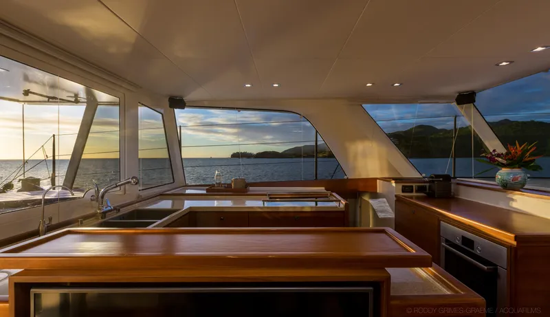 Slide: The Image of Luxurious interior of 2015 Gunboat 60 yacht with ocean view at sunset. - 19