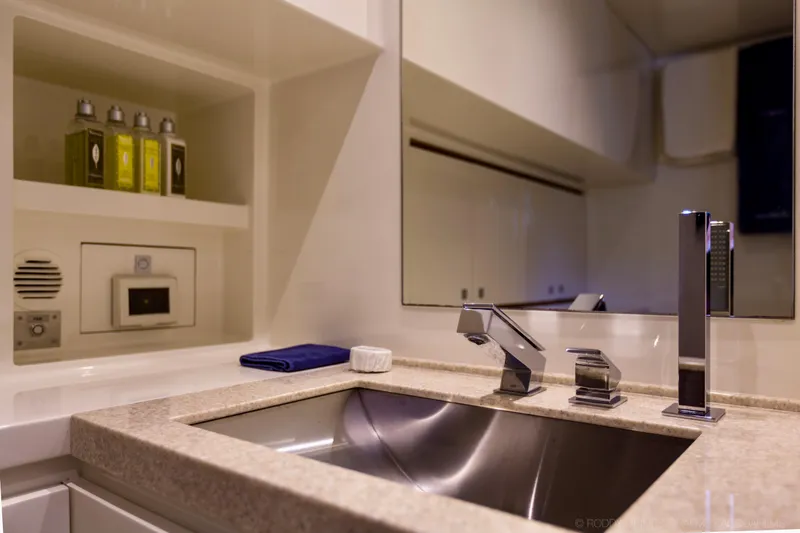 Slide: The Image of Luxury bathroom sink on 2015 Gunboat 60 yacht with modern fixtures and toiletries. - 24