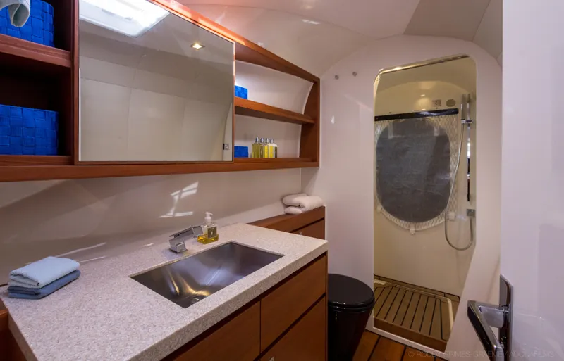 Slide: The Image of Luxurious bathroom interior of 2015 Gunboat 60 yacht with modern fixtures and wooden accents. - 25