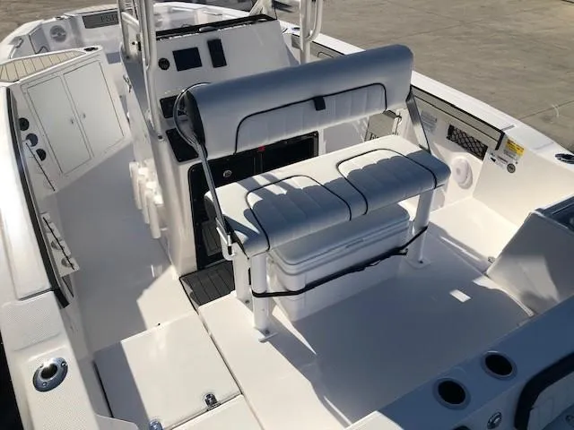 Slide: The Image of 2024 Yamaha Boats 220 FSH Sport interior, featuring sleek seating and modern dashboard design. - 15