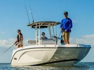 Slide: The Image of 2024 Yamaha Boats 220 FSH Sport with people fishing on the water. - 19