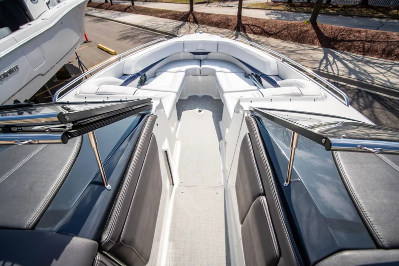 Slide: The Image of 2024 Formula 270 Bowrider boat with spacious seating and sleek design. - 10