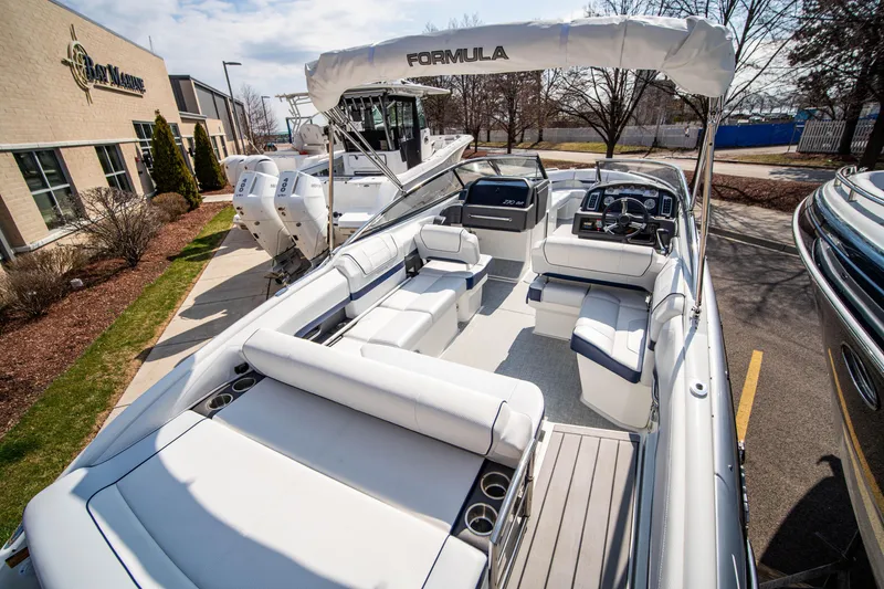Slide: The Image of 2024 Formula 270 Bowrider boat with spacious seating and modern design. - 12