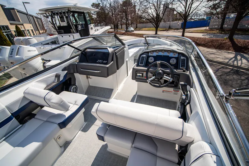 Slide: The Image of 2024 Formula 270 Bowrider interior with modern dashboard and seating. - 3