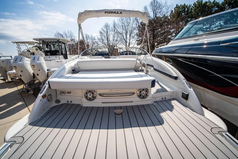 Slide: The Image of 2024 Formula 270 Bowrider boat with spacious deck and seating. - 4
