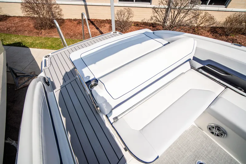 Slide: The Image of 2024 Formula 270 Bowrider boat with white seating and gray deck. - 5