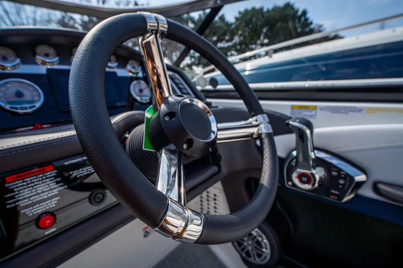Slide: The Image of 2024 Formula 270 Bowrider steering wheel and dashboard close-up. - 8