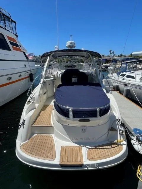 Slide: The Image of 2005 Cranchi 33 Express yacht docked at marina, featuring sleek design and spacious deck. - 29
