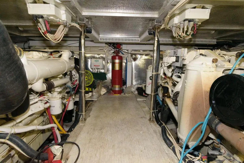 Slide: The Image of Engine room of a 2003 Carver 450 Voyager Pilothouse yacht. - 16