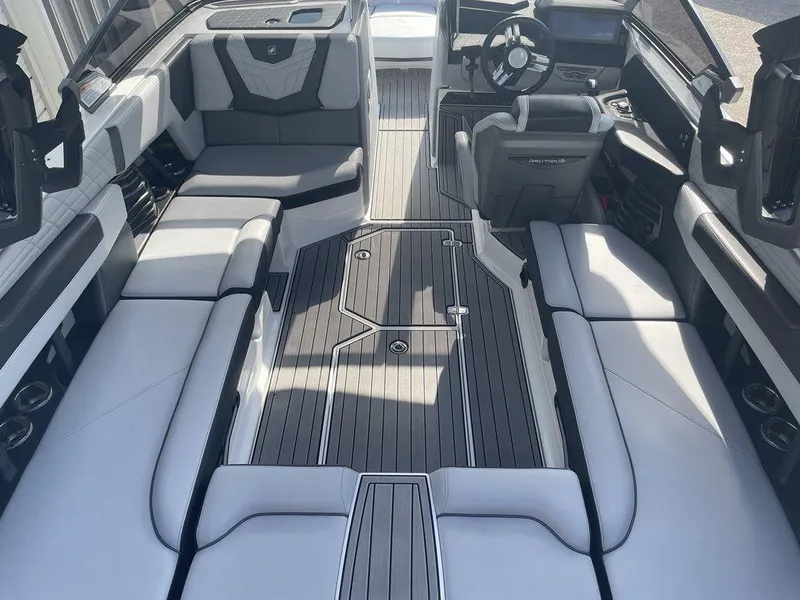 Slide: The Image of 2022 Nautique Super Air Nautique G23 interior, featuring luxurious seating and modern design. - 5