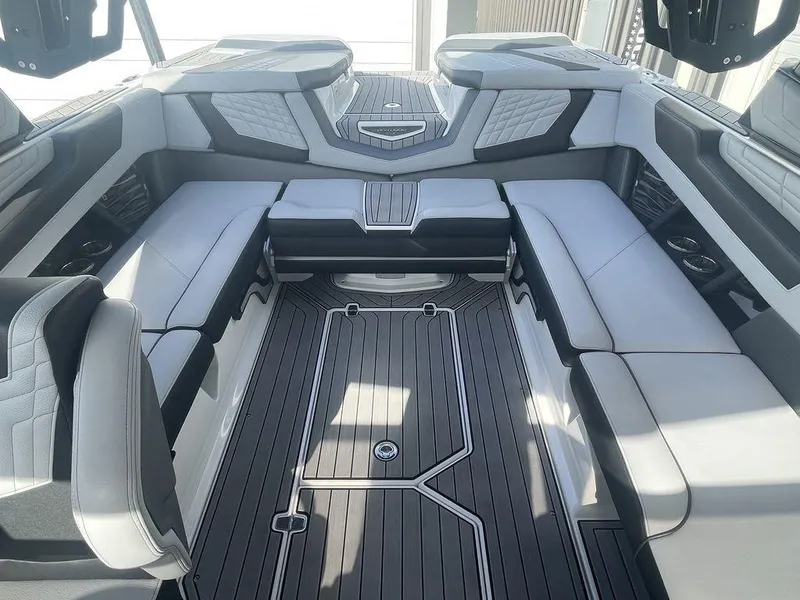 Slide: The Image of Interior of 2022 Nautique Super Air Nautique G23 boat with luxurious seating. - 7